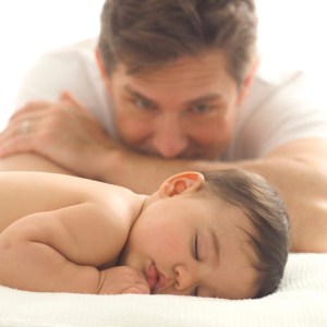 Father Watching His Infant Sleep